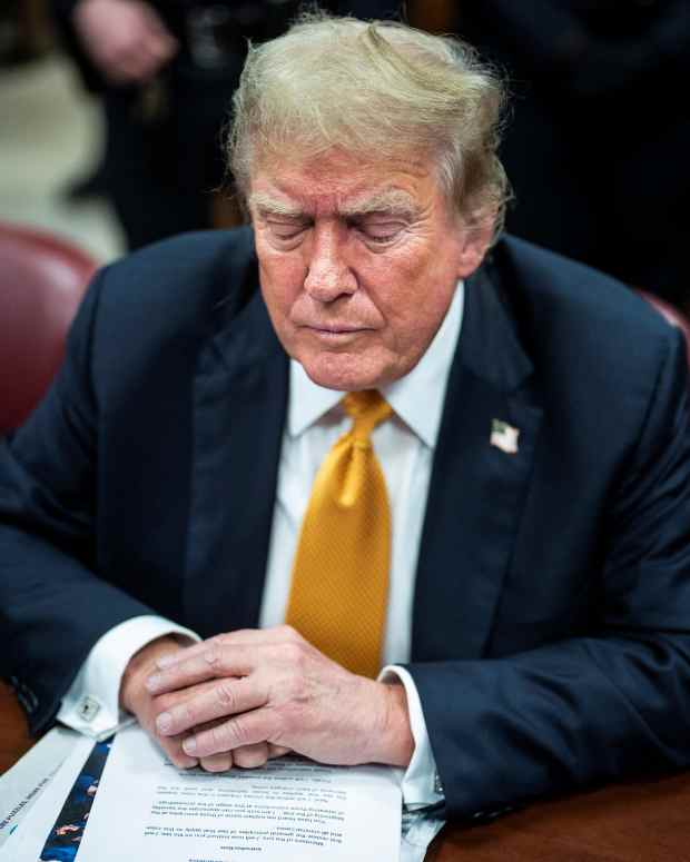 Former U.S. President Donald Trump sits at the defense table as he arrives for his criminal trial at the Manhattan Criminal Court in New York, NY on Wednesday, May 29, 2024. Trump was charged with 34 counts of falsifying business records last year, which prosecutors say was an effort to hide a potential sex scandal, both before and after the 2016 presidential election. Trump is the first former U.S. president to face trial on criminal charges. (Photo by Jabin Botsford/The Washington Post) Jabin Botsford/Pool via REUTERS 