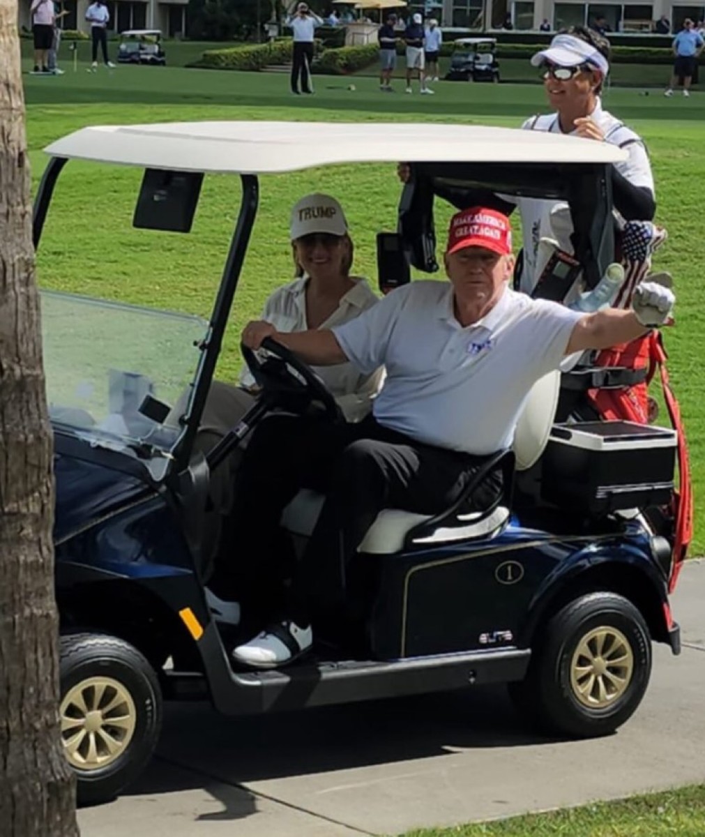 Trump driving a golf cart